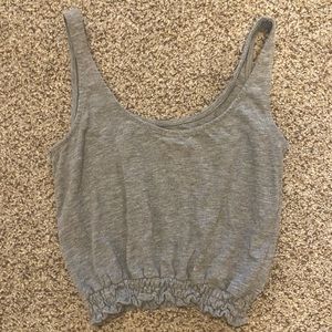 Juniors/ Misses - Light Heather Gray colored cropped tank, size Large.